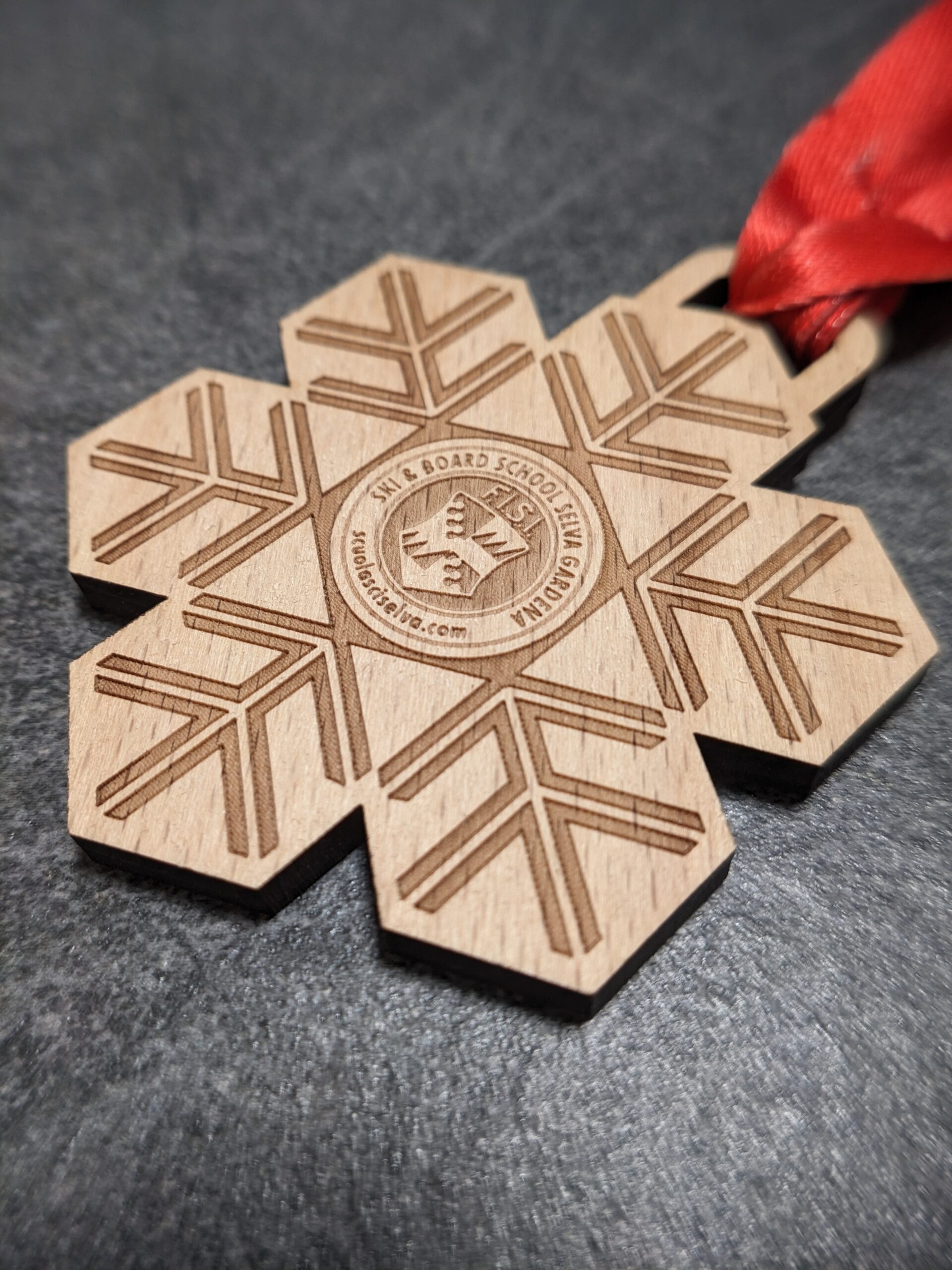 custom ski school selva medal made of natural laser cut and engraved wood with personalized sublimation ribbon side view custom ski school selva medal made of natural laser cut and engraved wood with personalized sublimation ribbon side view
